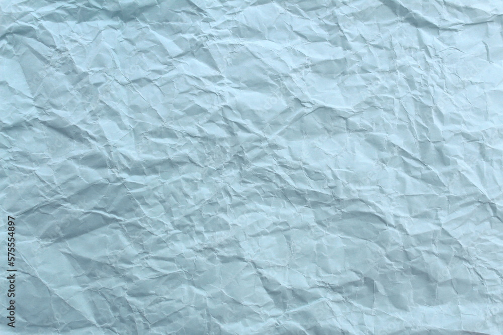 Soft crumpled sheet of light-colored paper. Abstract texture. Soft crumpled sheet of light-colored paper. Abstract texture.