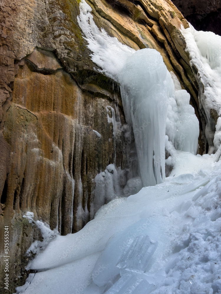 frozen waterfall waters and icicles inside the cave frozen waterfall waters and icicles inside the cave