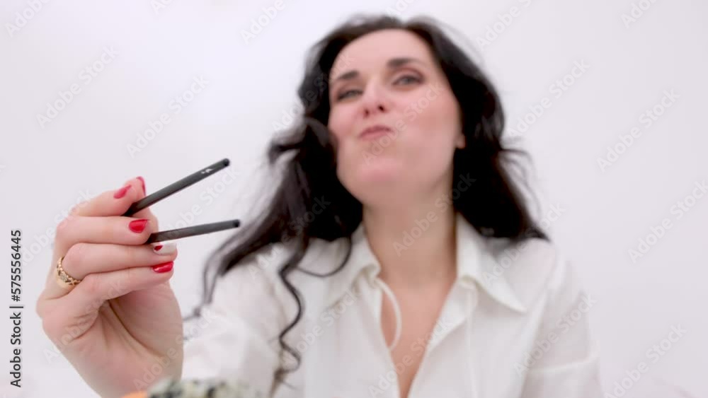 banner beautiful brunette eating sushi with chopsticks close-up face open mouth eyes narrowed with pleasure space for text sushi lunch tasty healthy japanese food rest banner beautiful brunette eating sushi with chopsticks close-up face open mouth eyes narrowed with pleasure space for text sushi lunch tasty healthy japanese food rest
