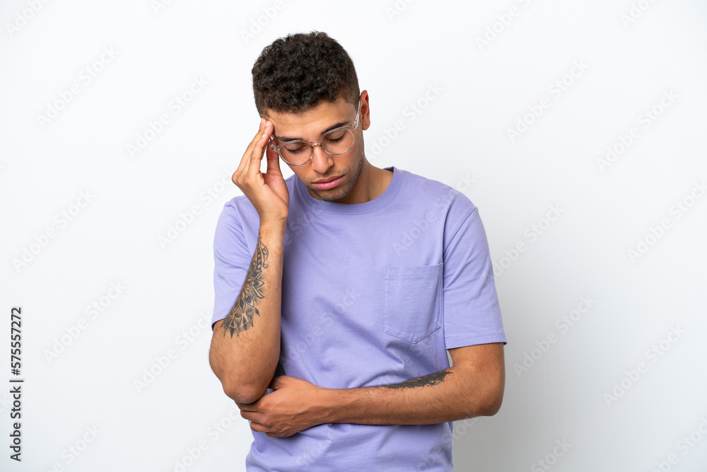 Young caucasian Brazilian man isolated on white background with headache Young caucasian Brazilian man isolated on white background with headache