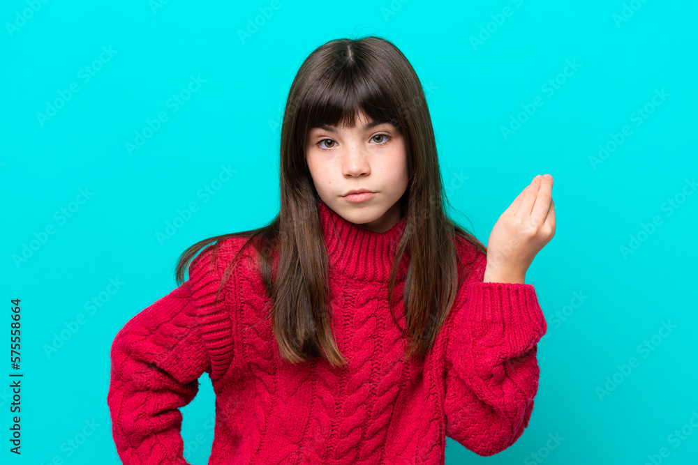 Little caucasian girl isolated on blue background making Italian gesture Little caucasian girl isolated on blue background making Italian gesture