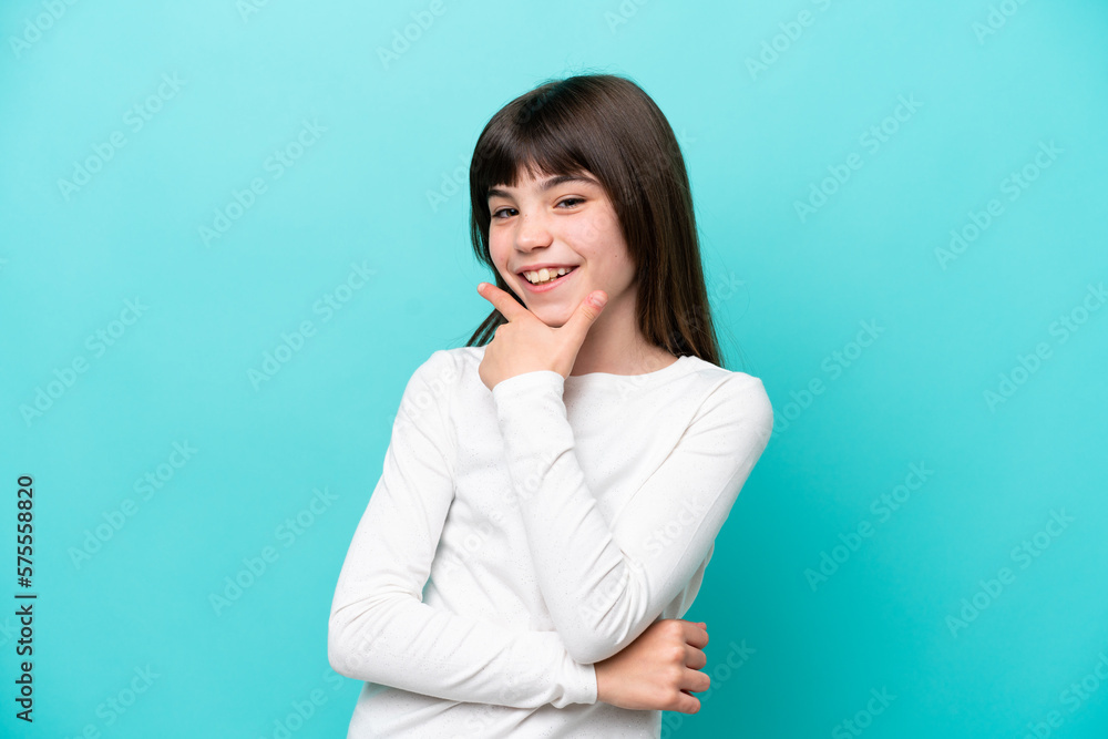 Little caucasian girl isolated on blue background happy and smiling Little caucasian girl isolated on blue background happy and smiling