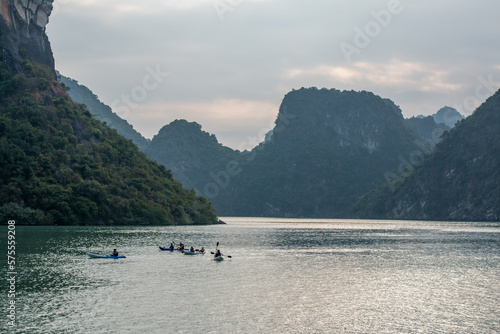 Kayakers on the water in the Ha Long Bay UNESCO World Heritage site in Qiang Ninh Province in northern Vietnam