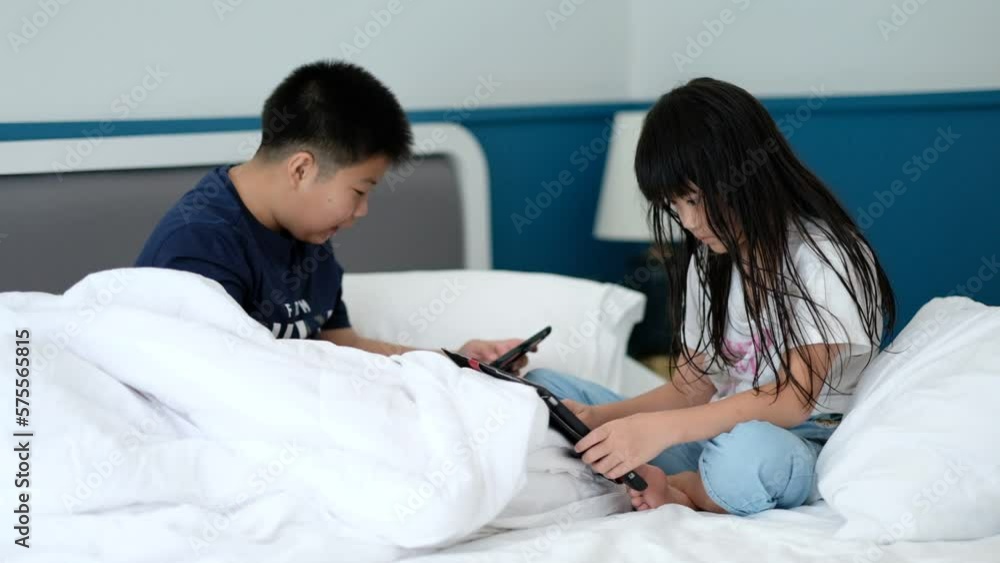 two children addicted tablet, asian kid watching cartoon
two children addicted tablet, asian kid watching cartoon
