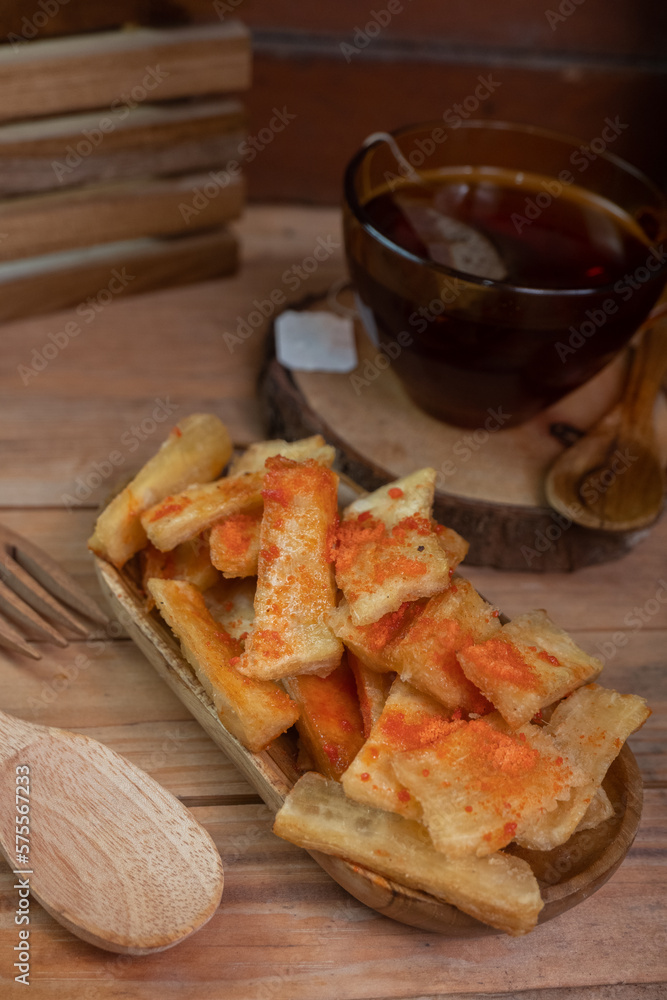 tela tela is a food originating from Indonesia which is made from fried cassava and sprinkled with balado seasoning powder tela tela is a food originating from Indonesia which is made from fried cassava and sprinkled with balado seasoning powder
