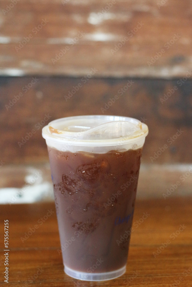Americano coffee on old wooden table in cafe Americano coffee on old wooden table in cafe