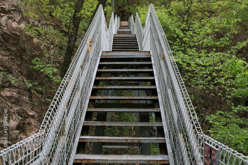 an iron staircase installed on a mountain