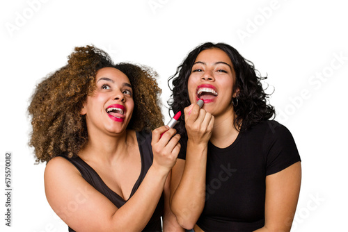 Two best friends, an Afro and Latina, get ready for a night out, laughing and having a great time while getting glam.