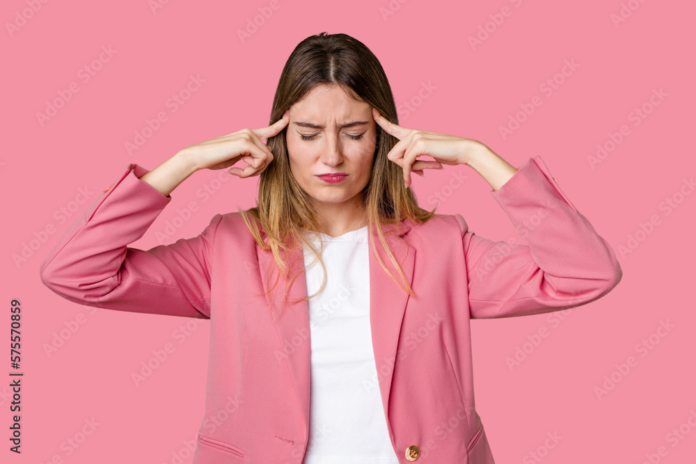 Young blonde posing for a portrait isolated, exuding natural beauty and radiance focused on a task, keeping forefingers pointing head. Young blonde posing for a portrait isolated, exuding natural beauty and radiance focused on a task, keeping forefingers pointing head.