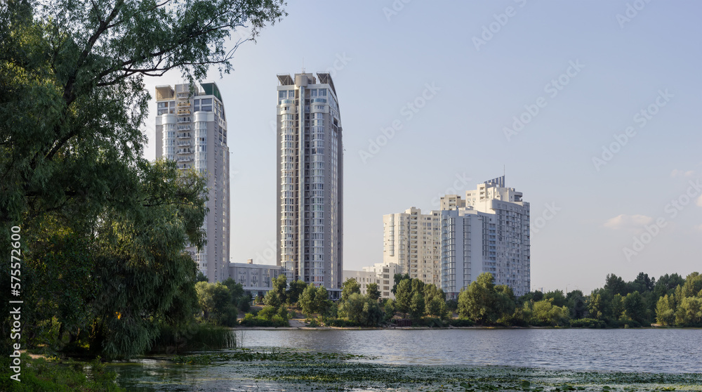 Modern multistory apartment complex on the river bank