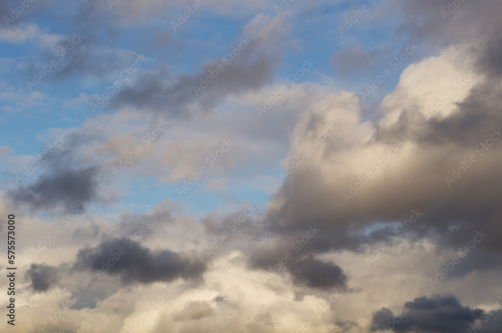 grey and white clouds on blue sky background