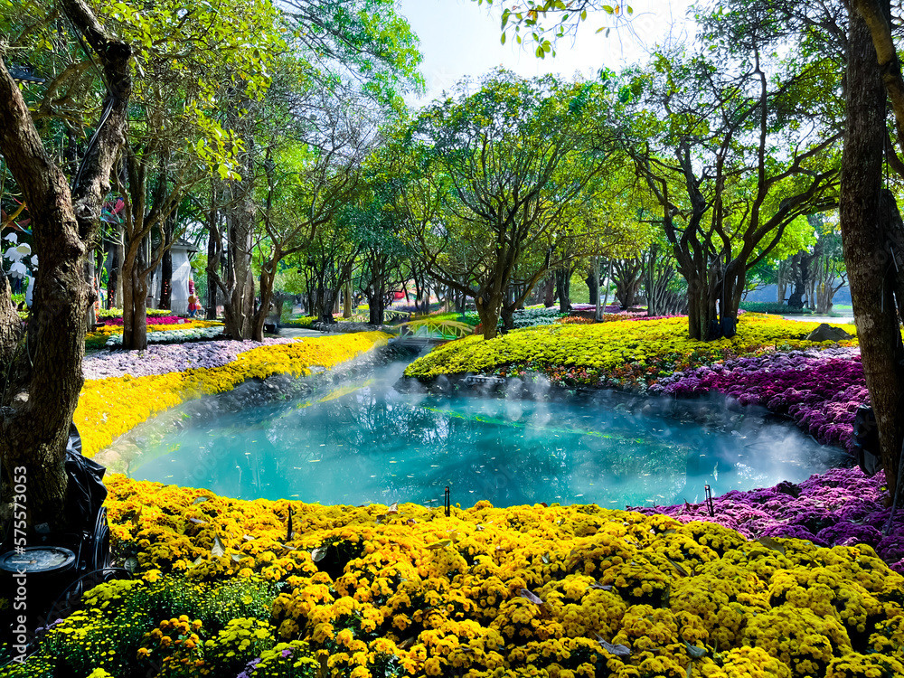 Naklejka premium Beautiful spring park with multicolor flowers.