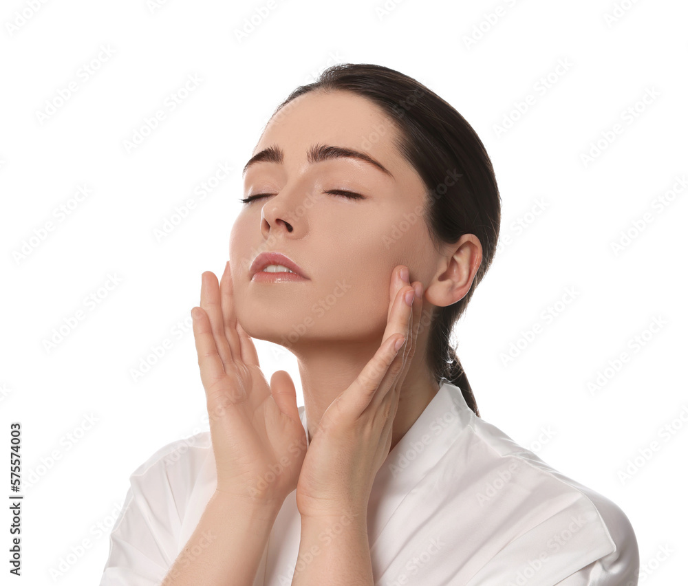 Young woman massaging her face on white background Young woman massaging her face on white background