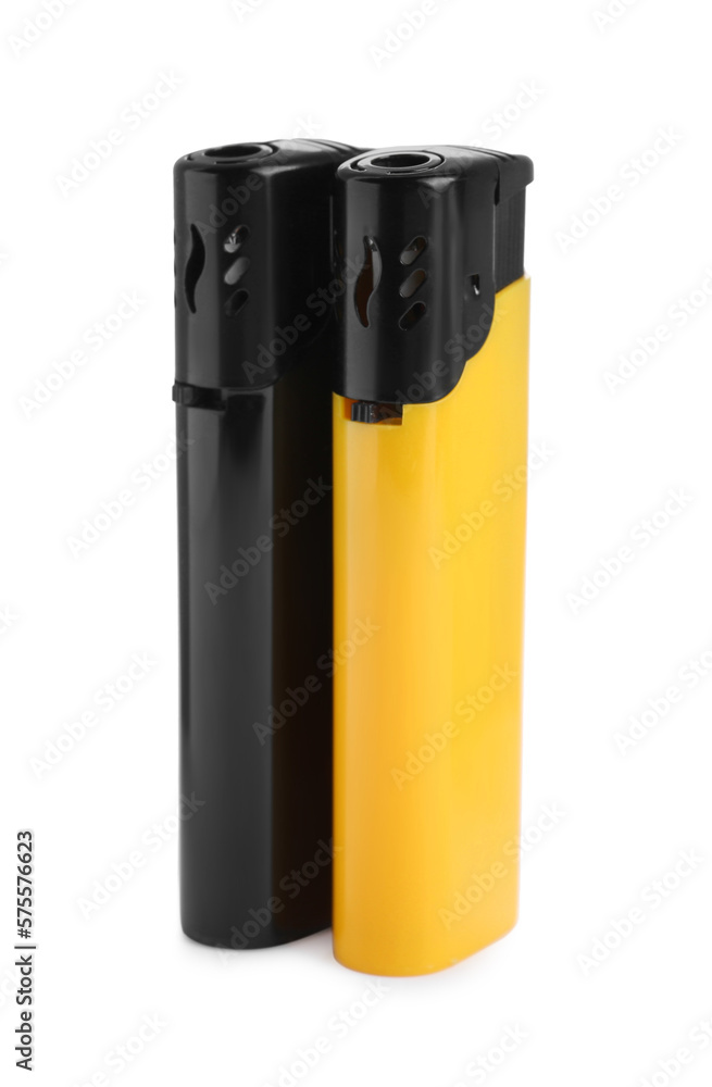 Stylish small pocket lighters on white background Stylish small pocket lighters on white background