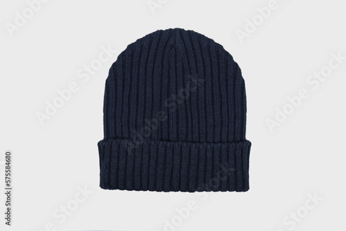 Blue men's knitted classic hat isolated on white background. Winter wool beanie hat, headwear. Templates, mock up, Men's cap for winter. Flat lay photo