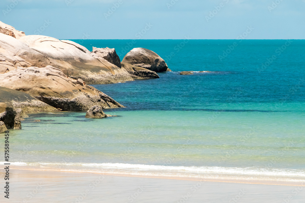 Calm surf and beach on Magnetic island, Australia Calm surf and beach on Magnetic island, Australia
