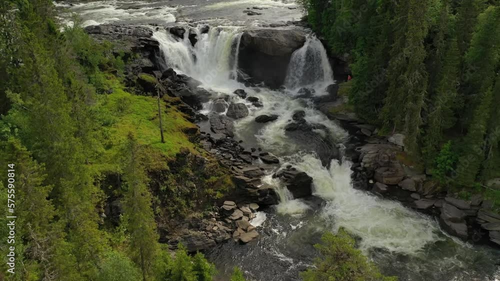 Ristafallet waterfall in the western part of Jamtland is listed as one of the most beautiful waterfalls in Sweden. Ristafallet waterfall in the western part of Jamtland is listed as one of the most beautiful waterfalls in Sweden.