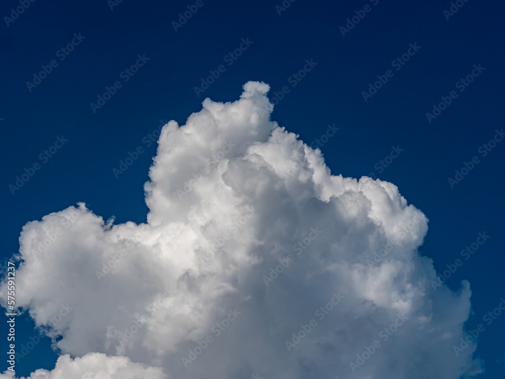 White fluffy big clouds against sky White fluffy big clouds against sky