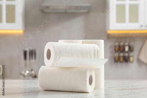 Canvastavla Rolls of paper towels on white marble table in kitchen