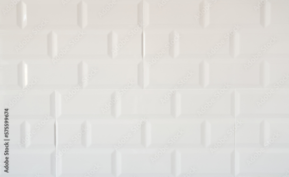 White ceramic tiles on the wall