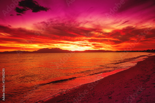 Seascape in the evening during sunset. Landscape with Aegean sea and Mount Olympus on the horizon. Aegean sea in Halkidiki, Greece, Europe