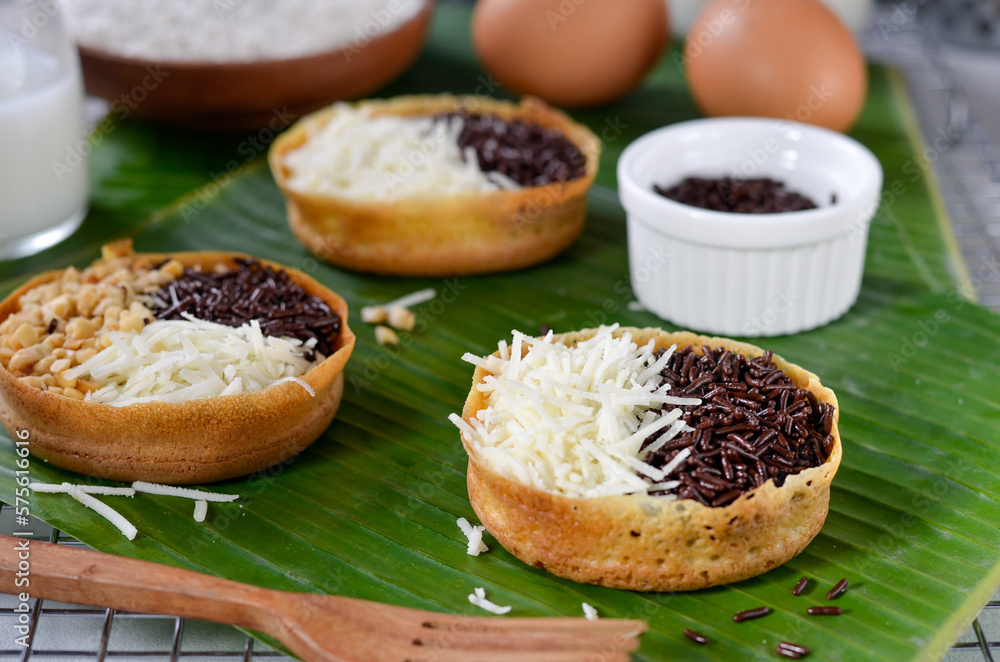 Martabak Terang Bulan mini, martabak manis mini or mini sweet martabak (mattabak), is Indonesian popular street food, made from flour, egg, yeast, topped with peanuts with chocolate
Martabak Terang Bulan mini, martabak manis mini or mini sweet martabak (mattabak), is Indonesian popular street food, made from flour, egg, yeast, topped with peanuts with chocolate