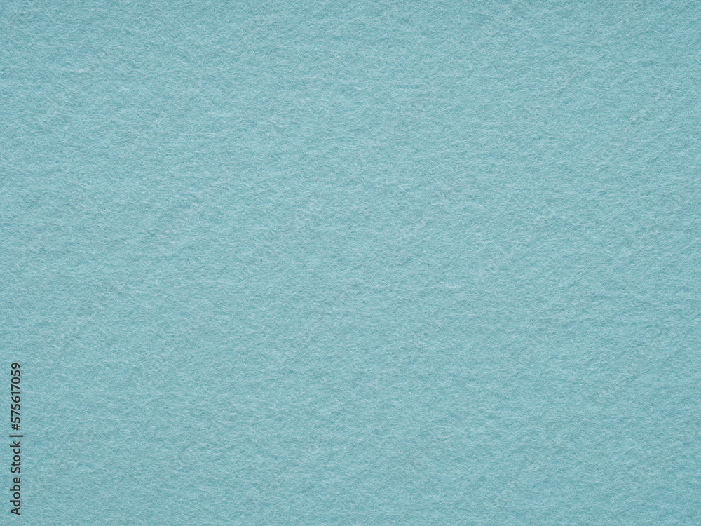 Soft blue matte felt material texture. Full frame matt backdrop wallpaper. Matt retro velvet pattern or vintage background in high resolution. Natural wool for text, lettering, patchworkor 3d art.