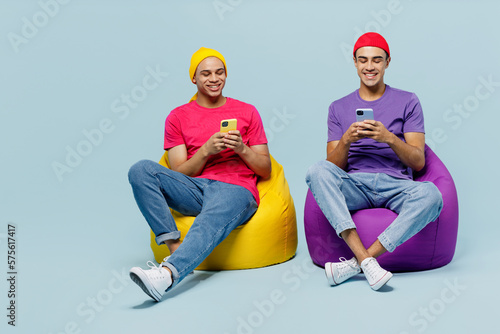 Leinwand Poster Full body smiling fun young couple two friend men wear casual clothes together s