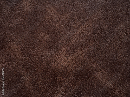 Luxury brown, leather textured surface. Genuine quality empty pattern in dark red tone. Eco rough background. Backdrop blank skin effect for design, upholstered furniture, purses, quality clothes.