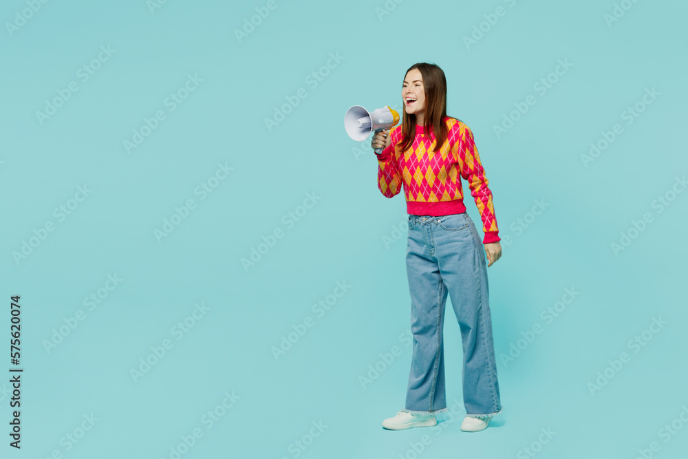 Full body young shocked excited woman wear bright casual clothes hold in hand megaphone scream announces discounts sale Hurry up isolated on plain pastel light blue cyan background. Lifestyle concept. Full body young shocked excited woman wear bright casual clothes hold in hand megaphone scream announces discounts sale Hurry up isolated on plain pastel light blue cyan background. Lifestyle concept.
