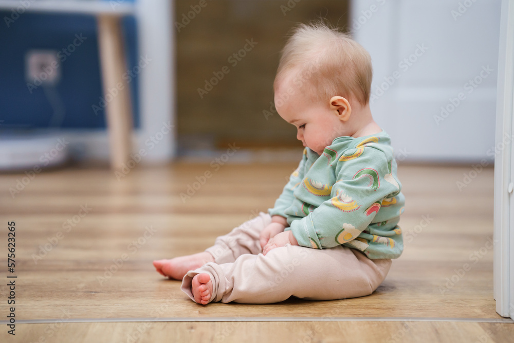Caucasian baby toddler crawls on all fours around the room Caucasian baby toddler crawls on all fours around the room