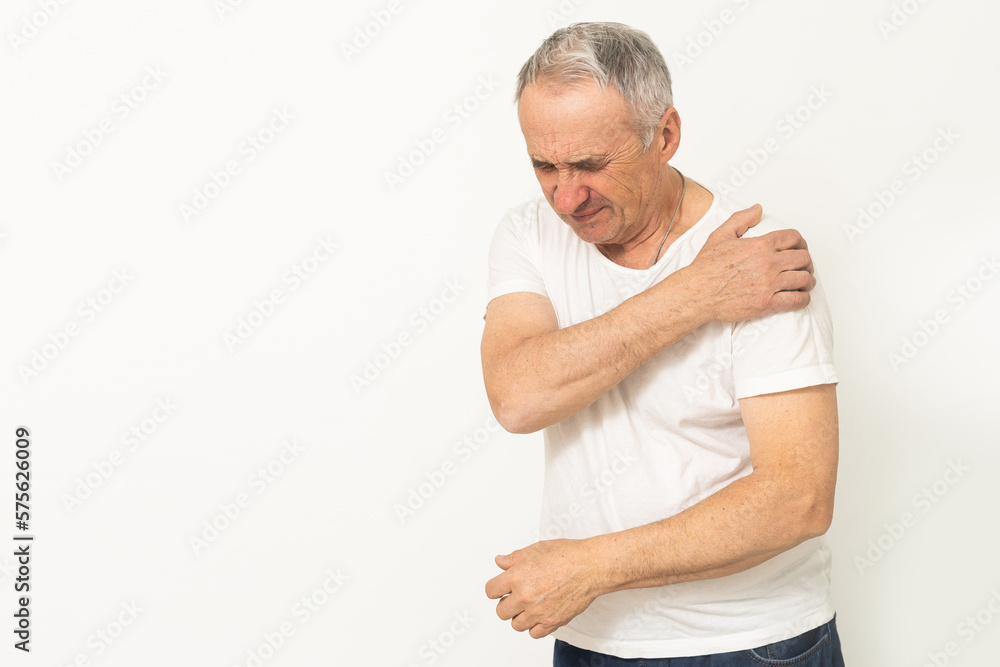 an elderly man's arm hurts an elderly man's arm hurts