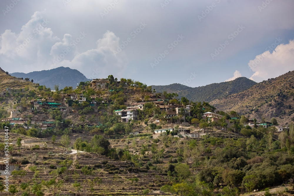 Traditional Pakistani village houses on the hill in rural area of Northern Pakistan