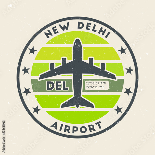 New Delhi airport insignia. Round badge with vintage stripes, airplane shape, airport IATA code, and GPS coordinates. Attractive vector illustration.