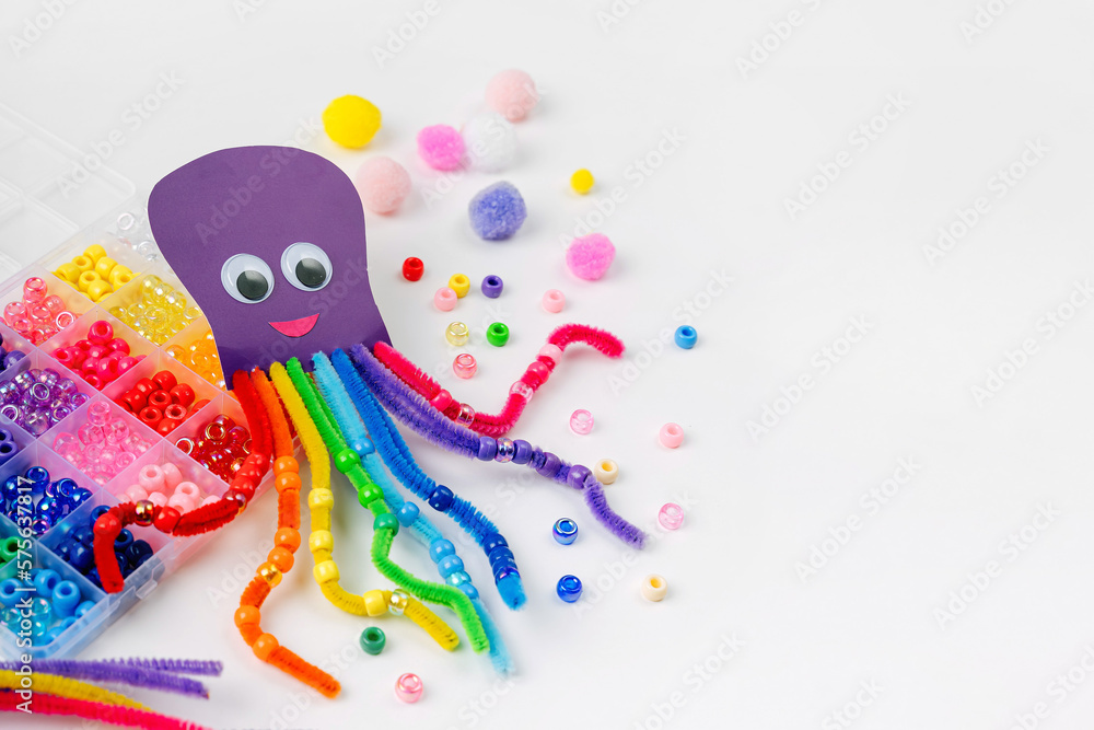 Funny octopus made of beads and pipe cleaners with different colorful