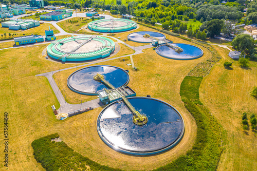 Aerial view of modern water cleaning facility at urban wastewater treatment plant. Purification process of removing undesirable chemicals, suspended solids and gases from contaminated liquid © netsay