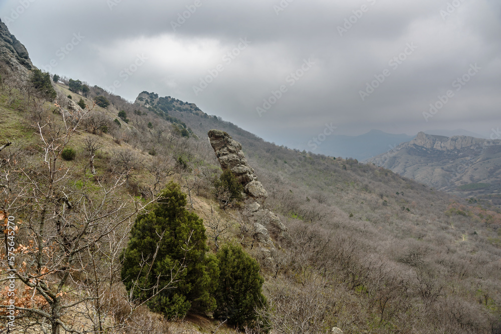 Landscape of Karadag Reserve in spring. View of different rocks. Crimea Landscape of Karadag Reserve in spring. View of different rocks. Crimea