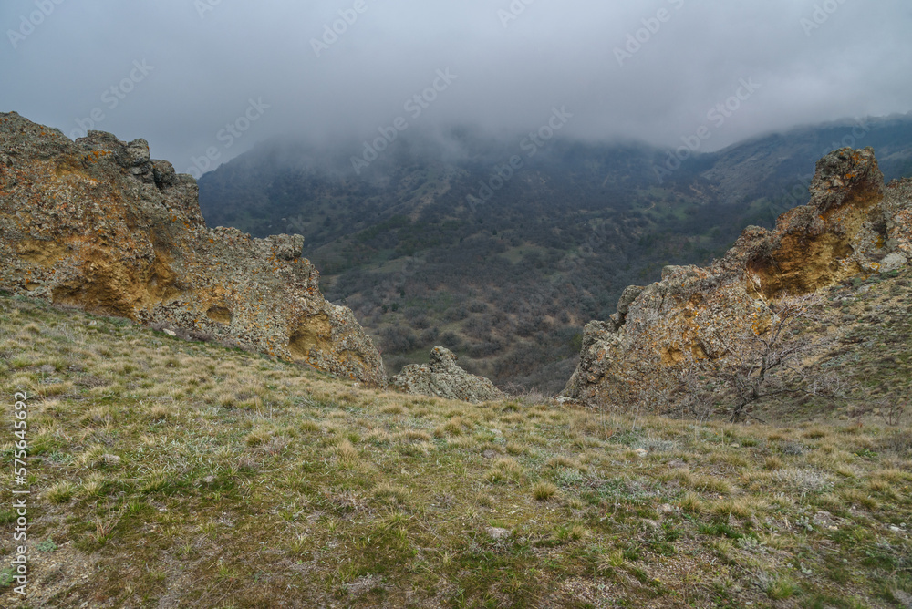 Fototapeta premium Landscape of Karadag Reserve in spring. View of rocks of ridge Karagach. Crimea