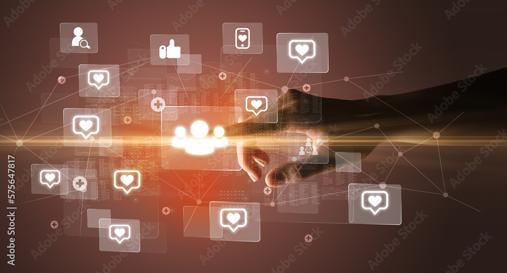Hand pressing social media multimedia application screen with media icons on futuristic concept Hand pressing social media multimedia application screen with media icons on futuristic concept