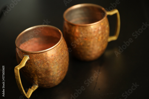 moscow mule cup holding empty golden and bronze before making a drink