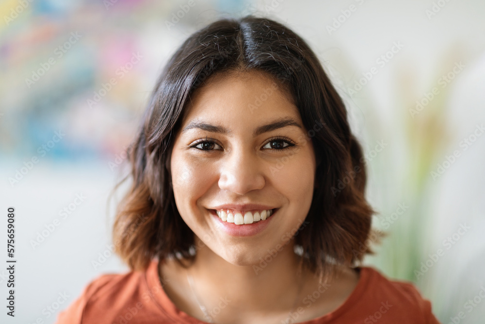 Portrait Of Happy Young Beautiful Arab Woman Smiling At Camera Portrait Of Happy Young Beautiful Arab Woman Smiling At Camera