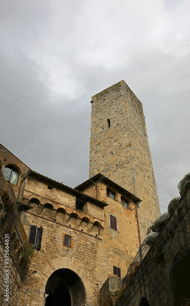 Ancient medieval tower in the ancient village of San gimignano near Siena in Italy Ancient medieval tower in the ancient village of San gimignano near Siena in Italy