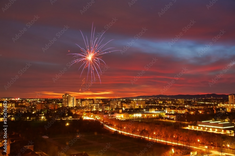 night view of the city with firework