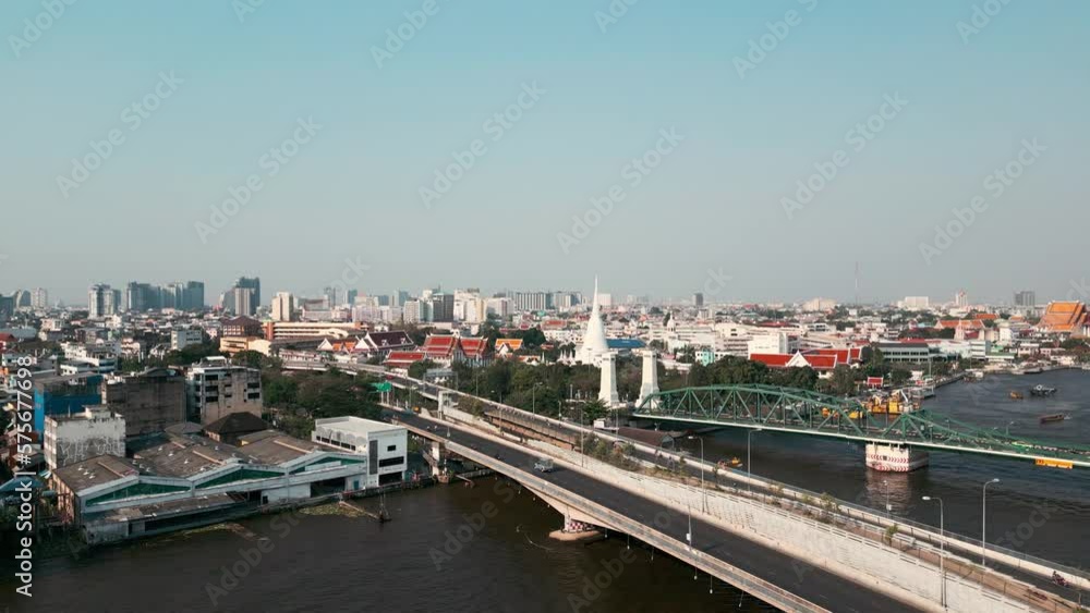 Aerial view city of Bangkok riverside with buddha temple sunny day travel sightseeing in Thailand Aerial view city of Bangkok riverside with buddha temple sunny day travel sightseeing in Thailand