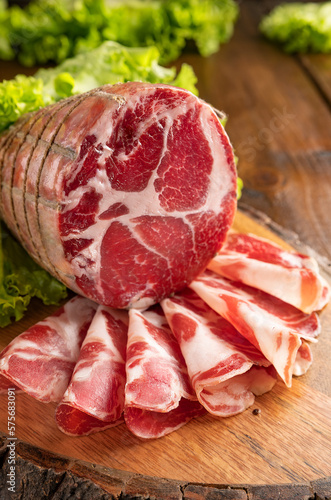 Capocollo or coppa is a traditional Italian and Corsican pork cut made from cured pork shoulder or neck. . Cut into very thin slices. Italian delicacy for aperitivo. Piacentina DOP. 