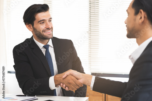 Wallpaper Mural Support, business people, happy asian young man in suit, making handshake, shake hand together with partnership, customer or colleague after is done, successful. Worker meeting, congrats merger. Torontodigital.ca