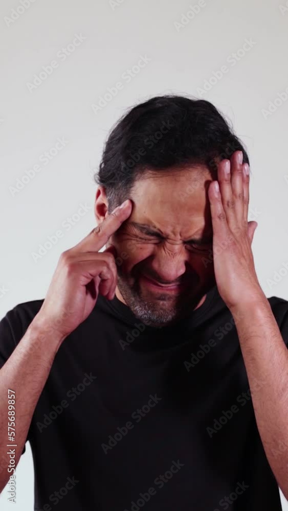 Video of person clutching his head in pain, trying to relieve it. Concept of diseases, migraine, stress, headache, health. Video of person clutching his head in pain, trying to relieve it. Concept of diseases, migraine, stress, headache, health.