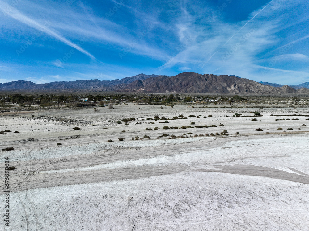 An Aerial UAV Drone View of the West Coast of the Salton Sea Near Thermal, California, Showing the Evaporated Salts from the Water and the abandoned Marina with the Infrastructure Seen in the Salt An Aerial UAV Drone View of the West Coast of the Salton Sea Near Thermal, California, Showing the Evaporated Salts from the Water and the abandoned Marina with the Infrastructure Seen in the Salt