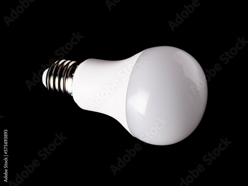 Economical LED light bulb isolated on a black