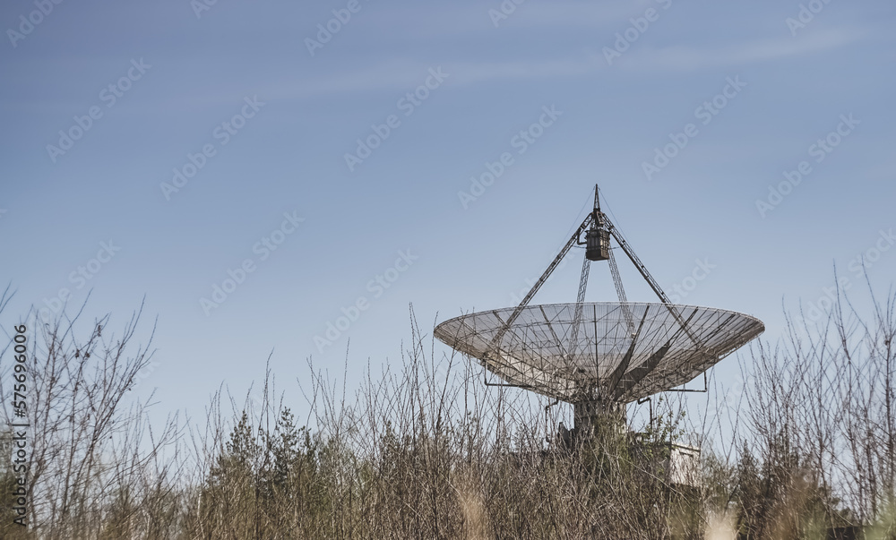 The metal structure of the astronomical radio telescope observatory on the territory of the Institute of the Ionosphere in the Kharkov region, on a spring sunny day The metal structure of the astronomical radio telescope observatory on the territory of the Institute of the Ionosphere in the Kharkov region, on a spring sunny day